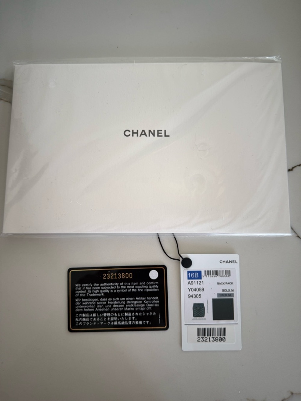 CHANEL Black Quilted Lambskin Backpack with Gold Chain - Picture 10 of 11